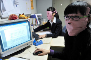 Illustration for article titled China's Radiation Masks Sure Make Computer Work Interesting